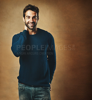 Buy stock photo Portrait, confidence and man in studio, fashion and warm in winter, smile and sweater for aesthetic. Proud, person and background of wall, model and cool with trend, stylish and jersey for clothes