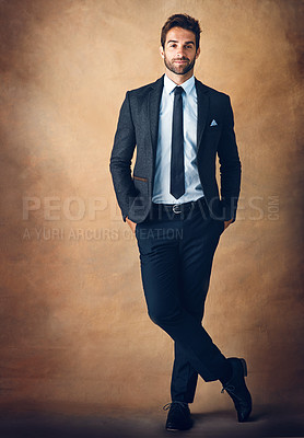 Buy stock photo Studio, portrait and man with corporate fashion, confidence or business professional in studio. Gentleman, trendy style and businessman on brown background with pride, opportunity or designer clothes