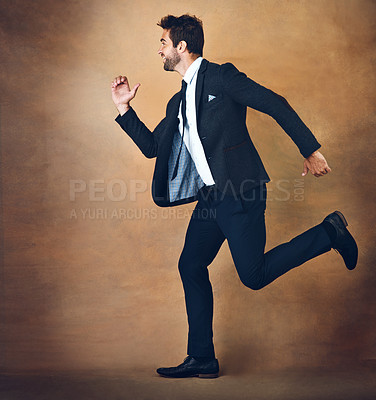 Buy stock photo Businessman, portrait and running for goals, mission and ambition. Male entrepreneur or professional and suit with hurry or rush to chase progress or reaching company target with studio background