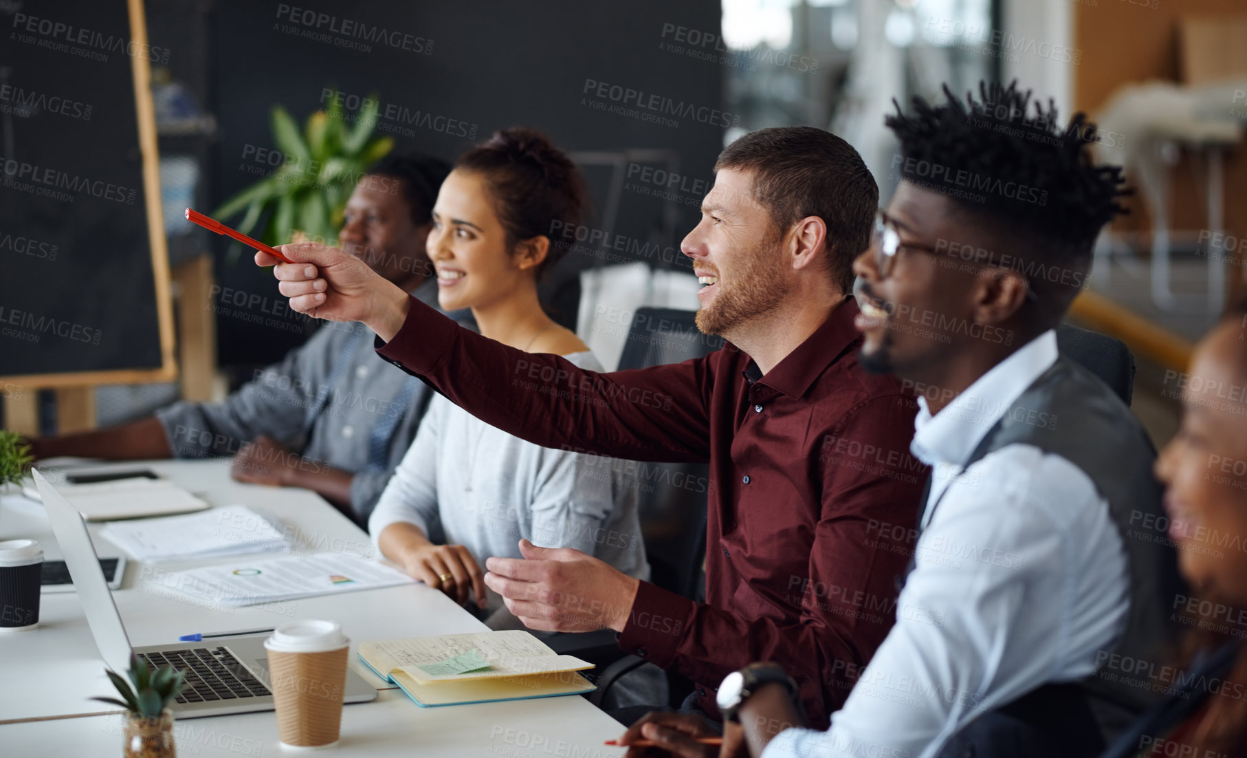 Buy stock photo Shot of a panel of businesspeople giving feedback during a presentation in an office