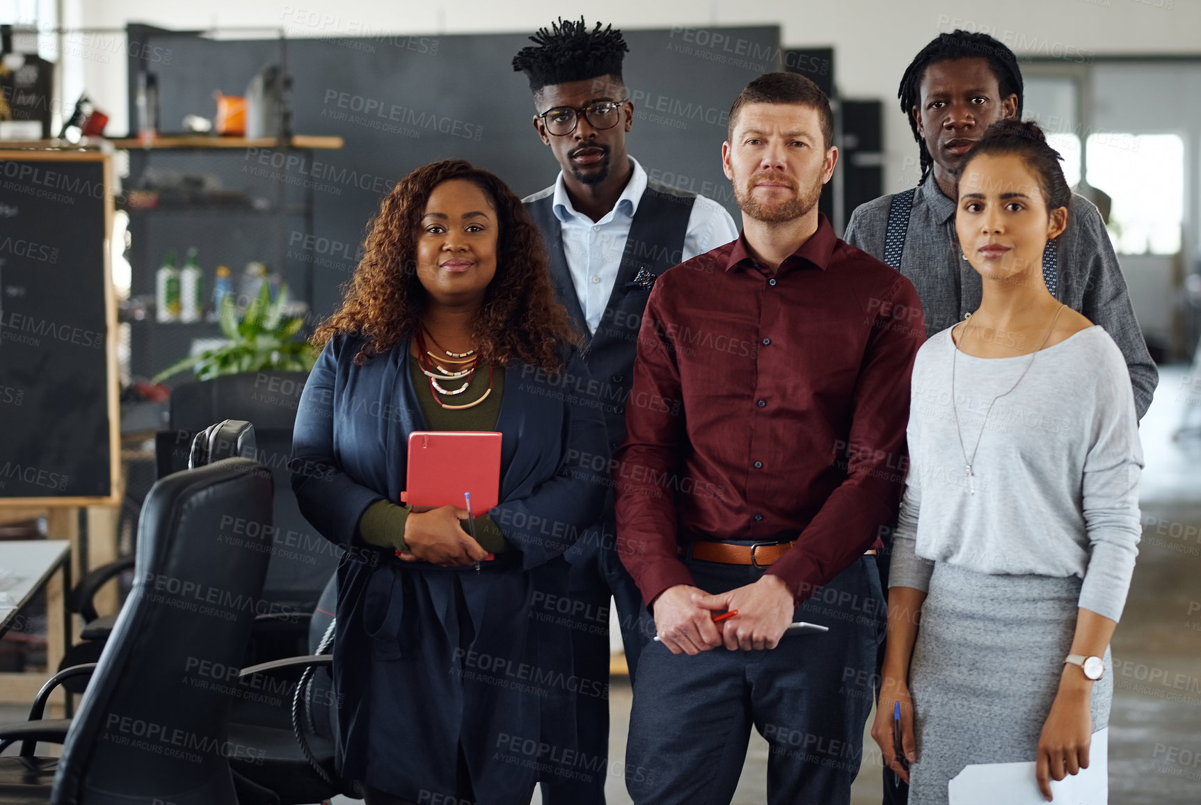 Buy stock photo Portrait of a group of businesspeople standing together in an office