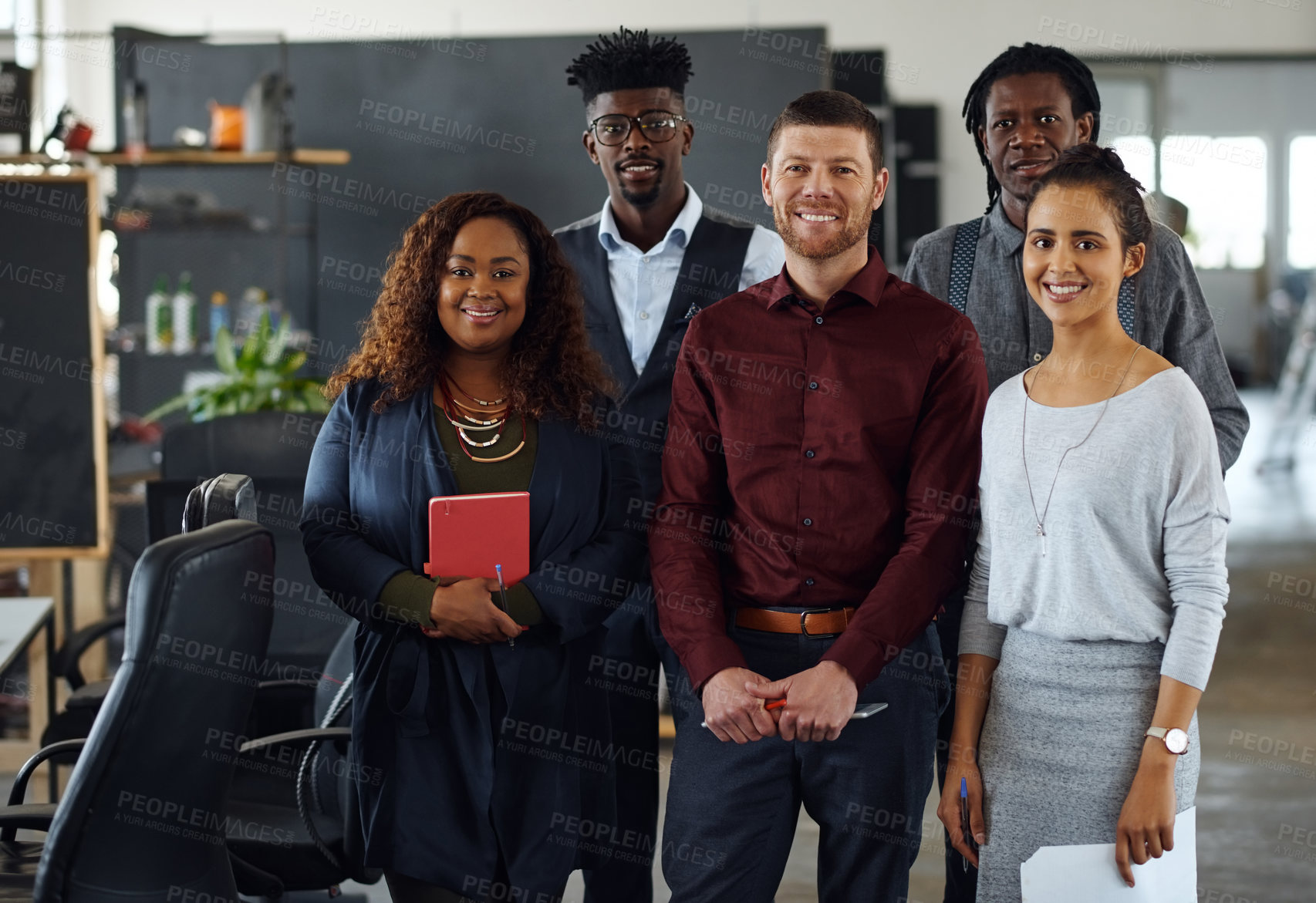 Buy stock photo Portrait of a group of businesspeople standing together in an office