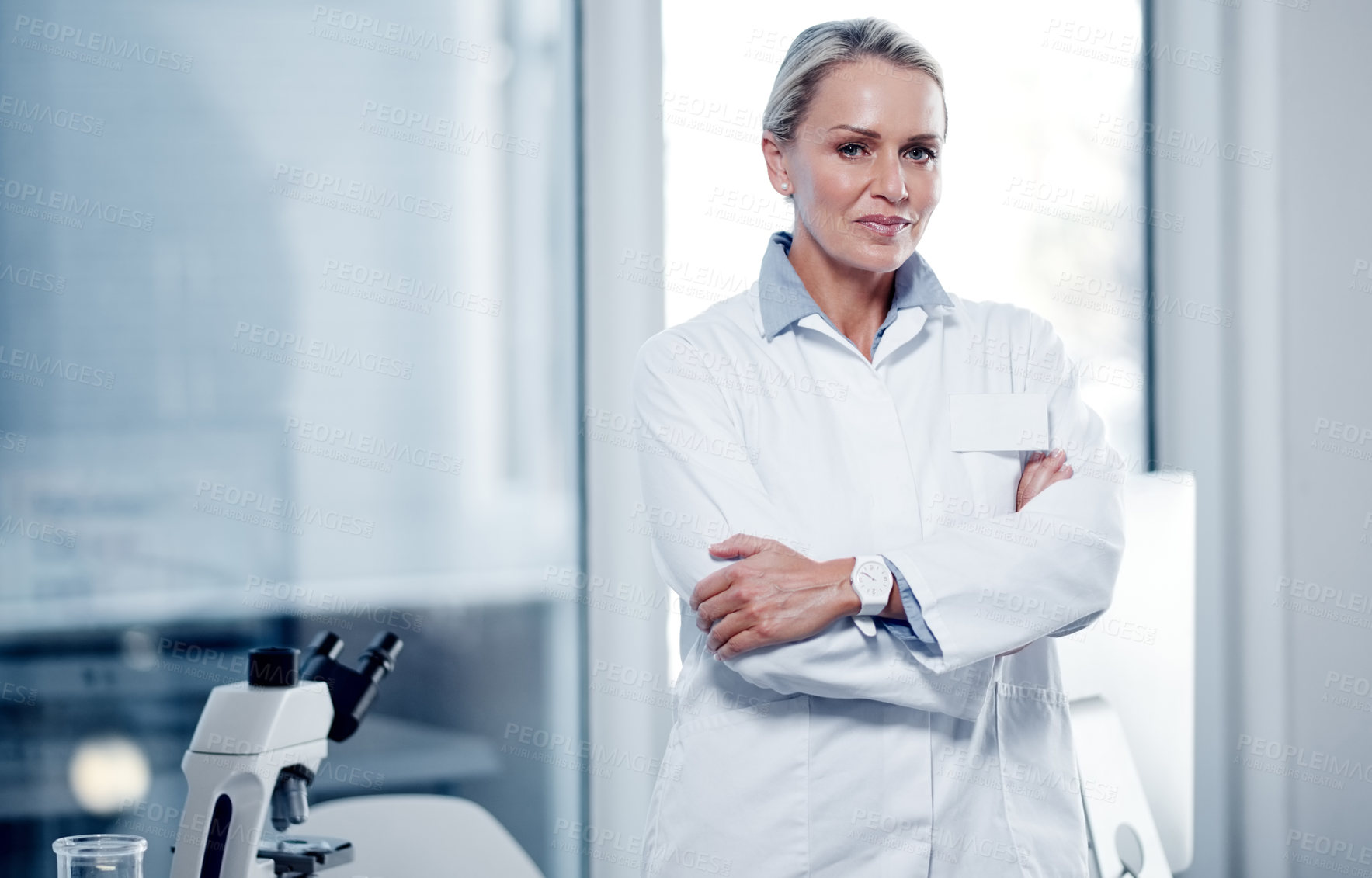 Buy stock photo Portrait of a mature scientist standing in a lab