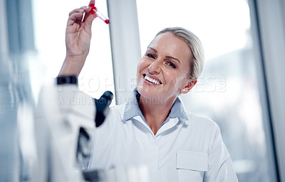 Buy stock photo Portrait of a mature scientist working in her lab