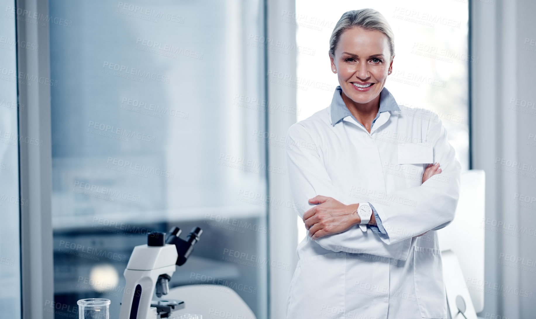 Buy stock photo Portrait of a mature scientist standing in a lab