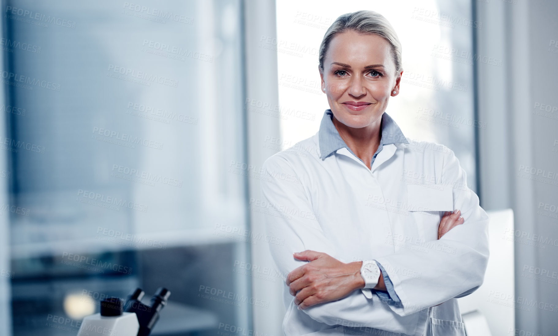 Buy stock photo Portrait of a mature scientist standing in a lab