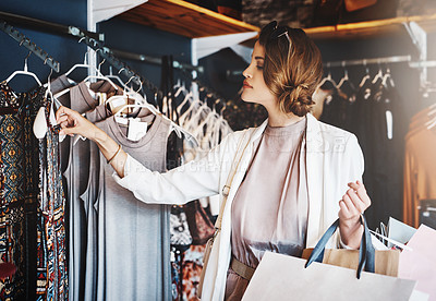 Buy stock photo Shopping, fashion or rich woman in boutique to search for clothing on sale, discount discount or selection. Customer, girl or elegant client shopper in store for outfit choices buying retail clothes