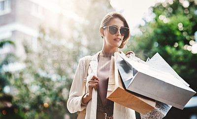 Buy stock photo Fashion, shopping bag or rich woman in city or street for boutique retail sale, or clothes discount deals. Sunglasses, financial freedom or trendy girl customer walking on road with luxury products