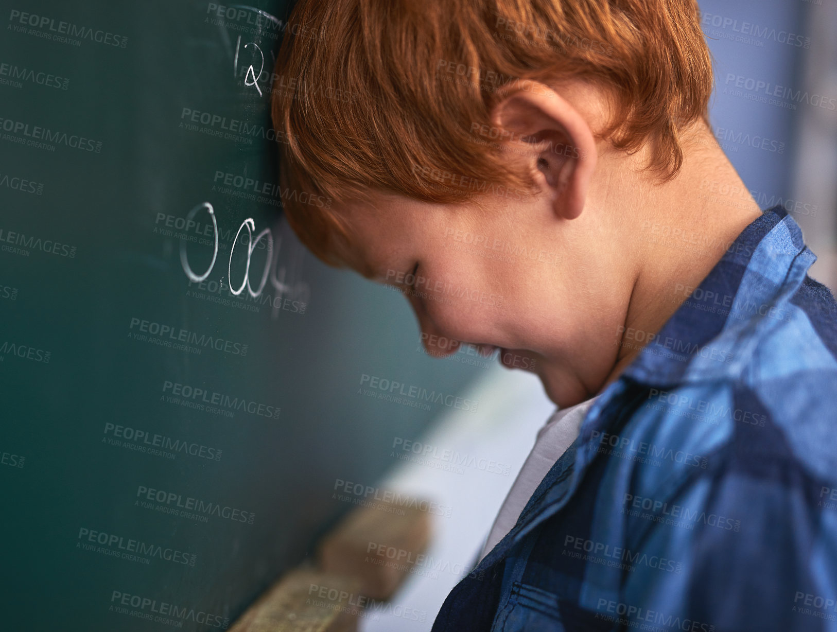 Buy stock photo Kid, blackboard and boy in classroom, frustrated and stress with thinking, depression and sad. School, angry and student with autism, learning and lazy with tears, pressure and emotion with anxiety