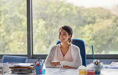 Buy stock photo Shot of young female teacher in a classroom 