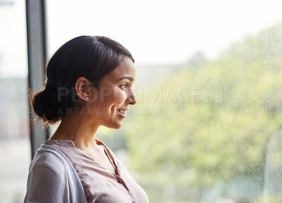 Buy stock photo Shot of young female teacher in a classroom 