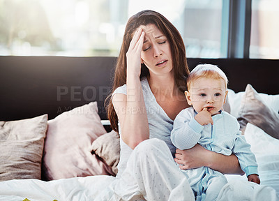 Buy stock photo Mother, baby and tired or stress in a home bedroom or bed with postpartum, headache or anxiety. Depression, mental health and burnout of a woman or mom with a child in a family house with fatigue