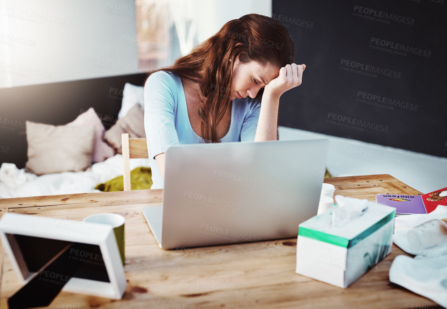 Buy stock photo Cropped shot of a young businesswoman trying to work while suffering with the flu