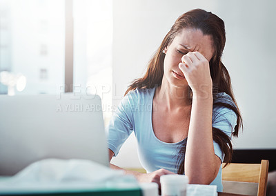 Buy stock photo Stress, remote work and woman with a migraine working on freelance project with laptop at home. Burnout, fatigue and sick female freelancer with headache in pain doing research at a desk or workspace