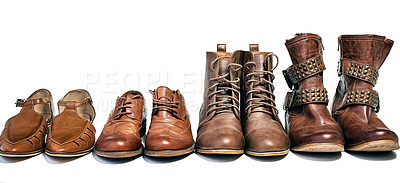 Buy stock photo Shot of a selection of shoes lined up together