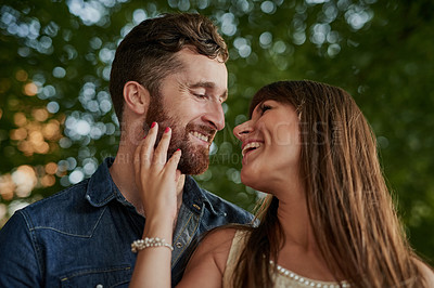 Buy stock photo Date, smile and couple laughing outdoor for love, romance or healthy relationship together. Vacation, happy man and woman in nature for funny conversation, connection or loyalty to partner on holiday