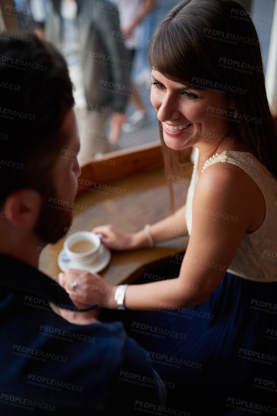 Buy stock photo Coffee shop, talking and couple holding hands with drink, caffeine beverage and cappuccino in cafe. Dating, love and man and woman relax in restaurant for bonding, relationship and romance on weekend