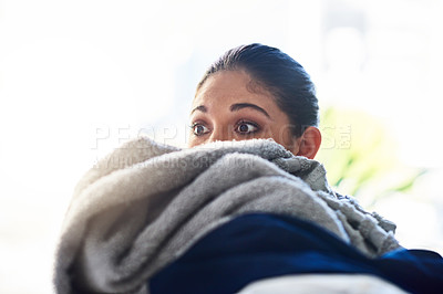 Buy stock photo Shot of a woman doing her daily chores at home 