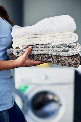 Buy stock photo Home, hands and woman with towels after laundry, housekeeping and cleaning in house. Female person, routine or domestic responsibility with fabric for washing, fold and hygiene care with soft texture