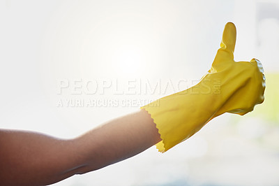 Buy stock photo Shot of an unrecognizable woman doing her daily chores at home