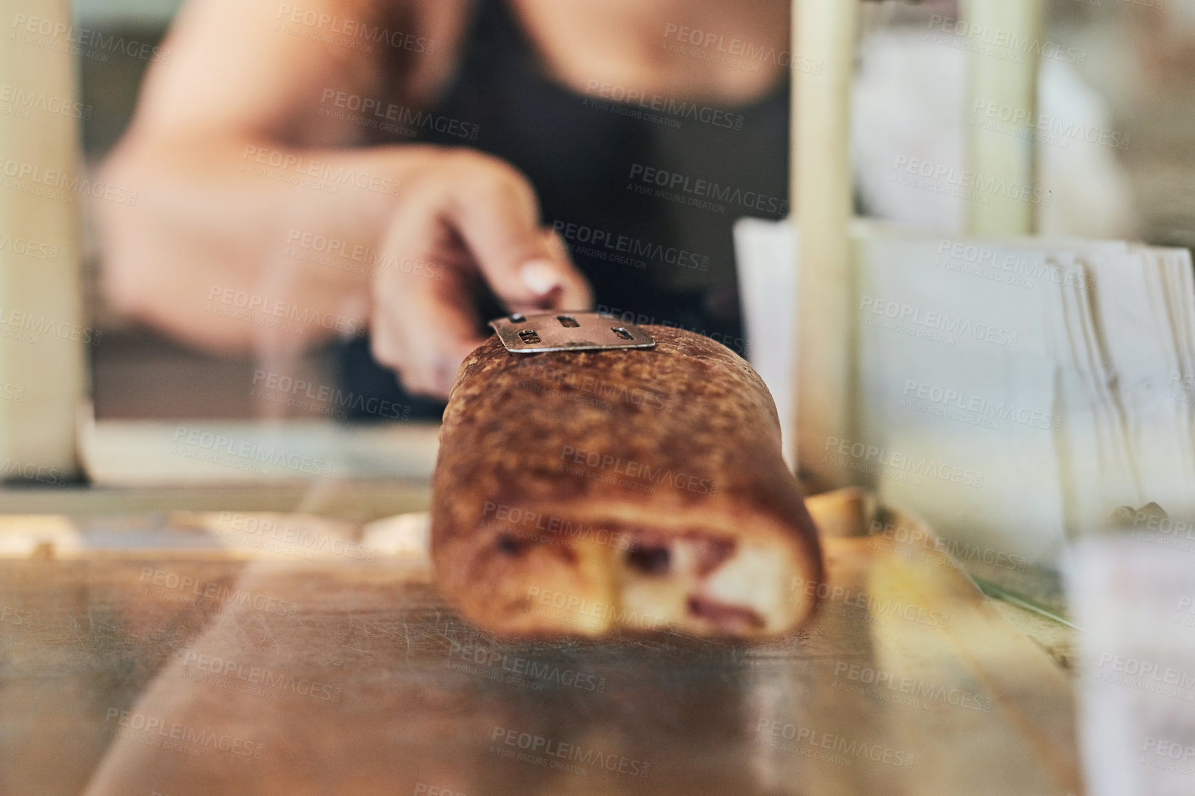 Buy stock photo Bakery, bread and hand of person in store for small business, entrepreneur and restaurant. Coffee shop manager, barista and waitress with employee in cafe for food service, server and hospitality