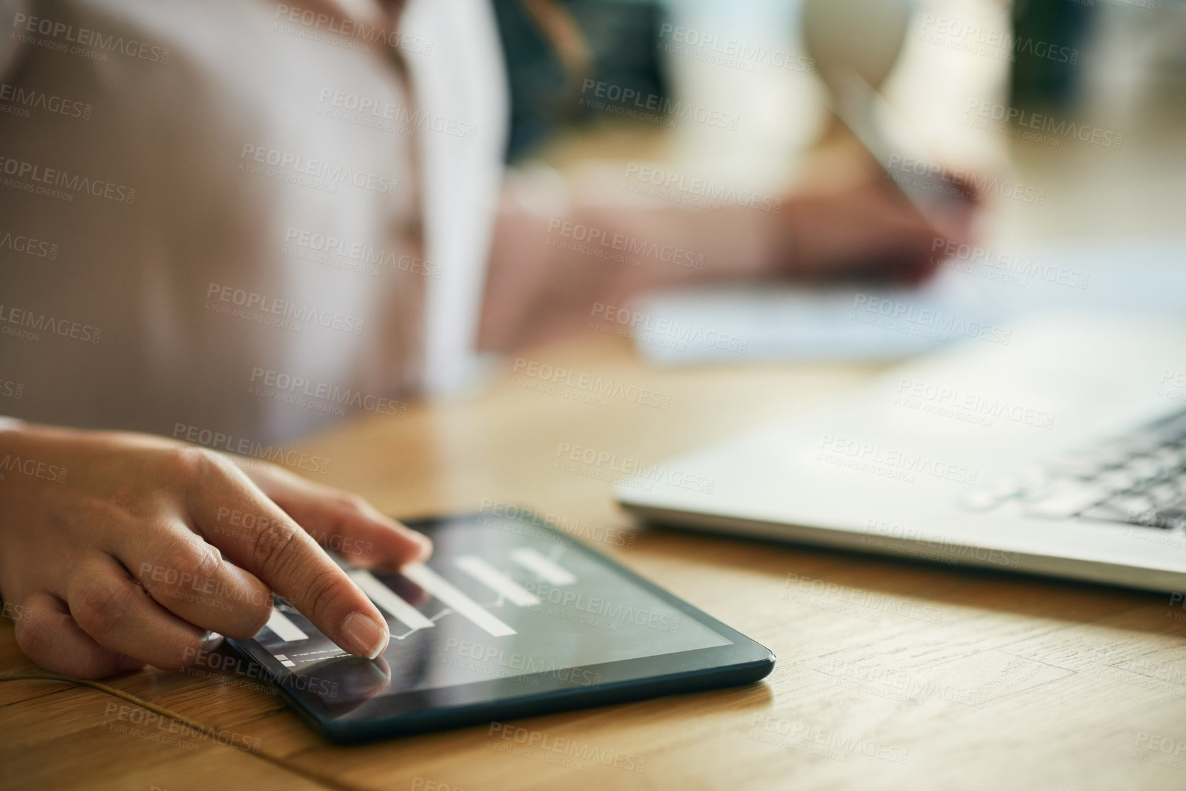 Buy stock photo Hand, graph and technology while a woman zoom in on a tablet to check the growth and development of her company. Closeup of a businesswoman, data analyst and accountant checking financial charts