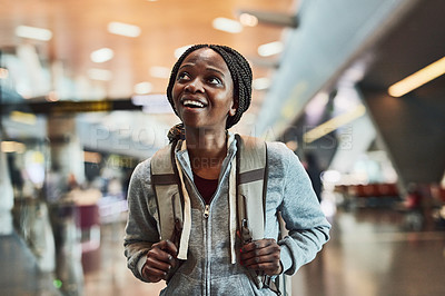 Buy stock photo Cropped shot of a happy young woman at the airport