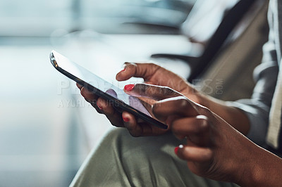 Buy stock photo Cropped shot of an unrecognizable woman using her digital tablet