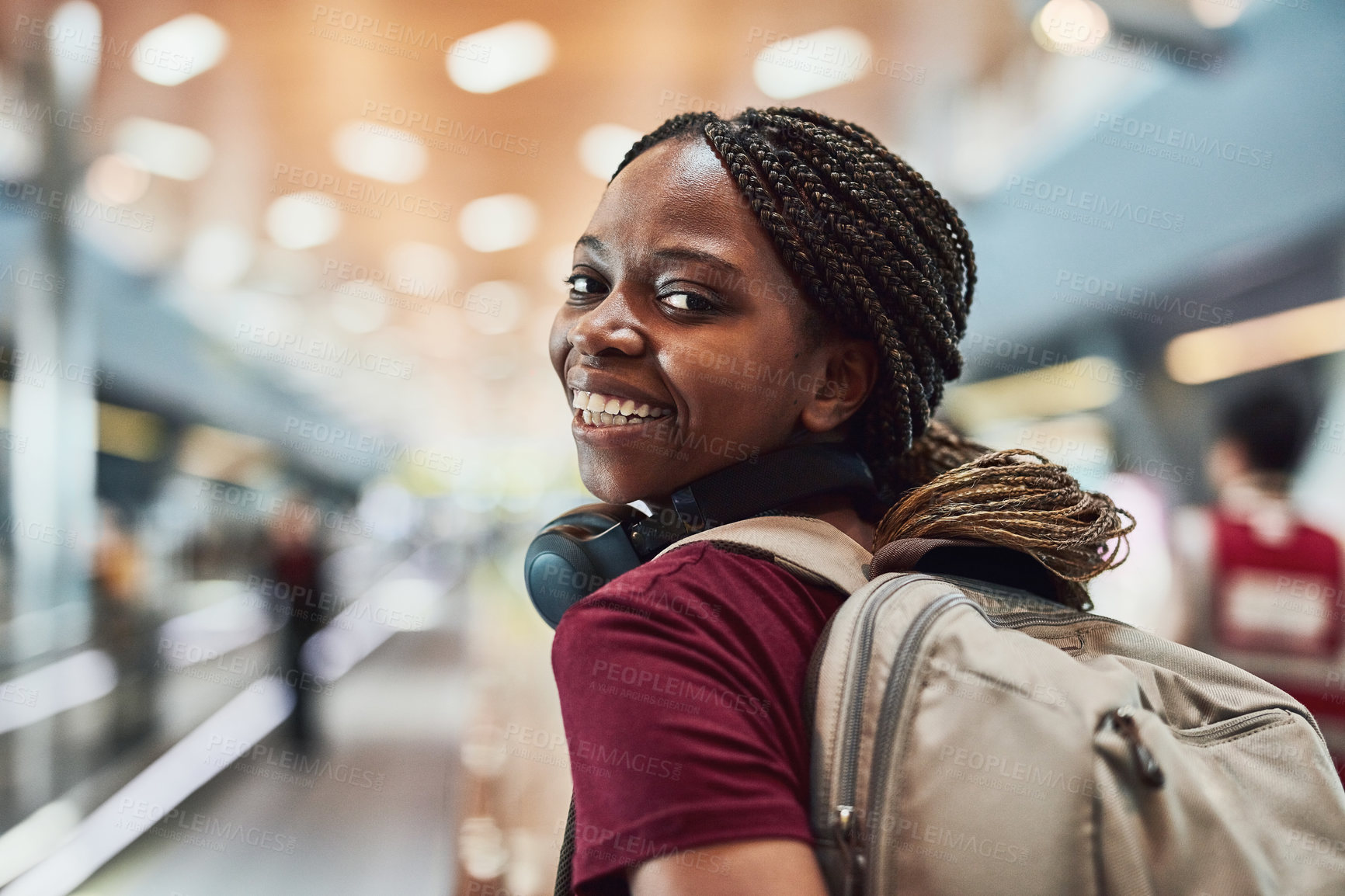 Buy stock photo Cropped shot of a happy young woman at the airport