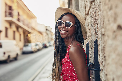 Buy stock photo Freedom, travel and black woman for holiday, journey or excited outdoors on foreign street. Vacation, smile and happy girl having fun, enjoying and exploring downtown with carefree joy and sunglasses