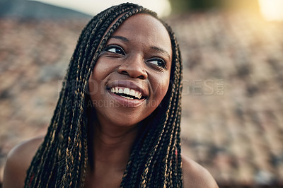 Buy stock photo Cropped shot of a beautiful young woman outside