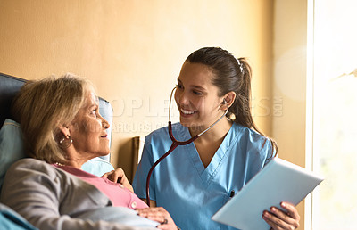 Buy stock photo Tablet, old woman and nurse with stethoscope, results and consultation for heart condition. Caregiver, pensioner or professional with tech, healthcare or wellness with digital app for report or smile