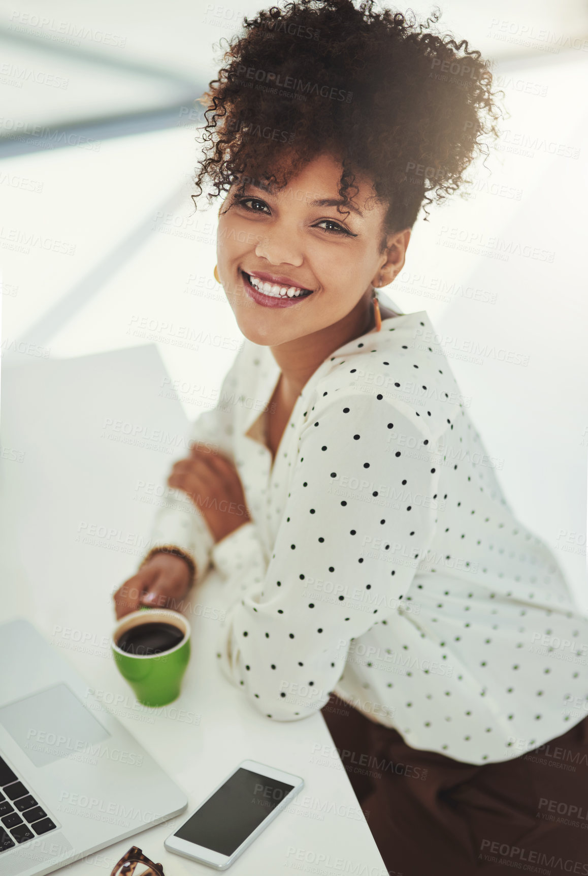 Buy stock photo Businesswoman, happy and portrait for drinking coffee in office with morning routine, caffeine break or top view. Employee, person or warm beverage at table for relax or start day with laptop at desk