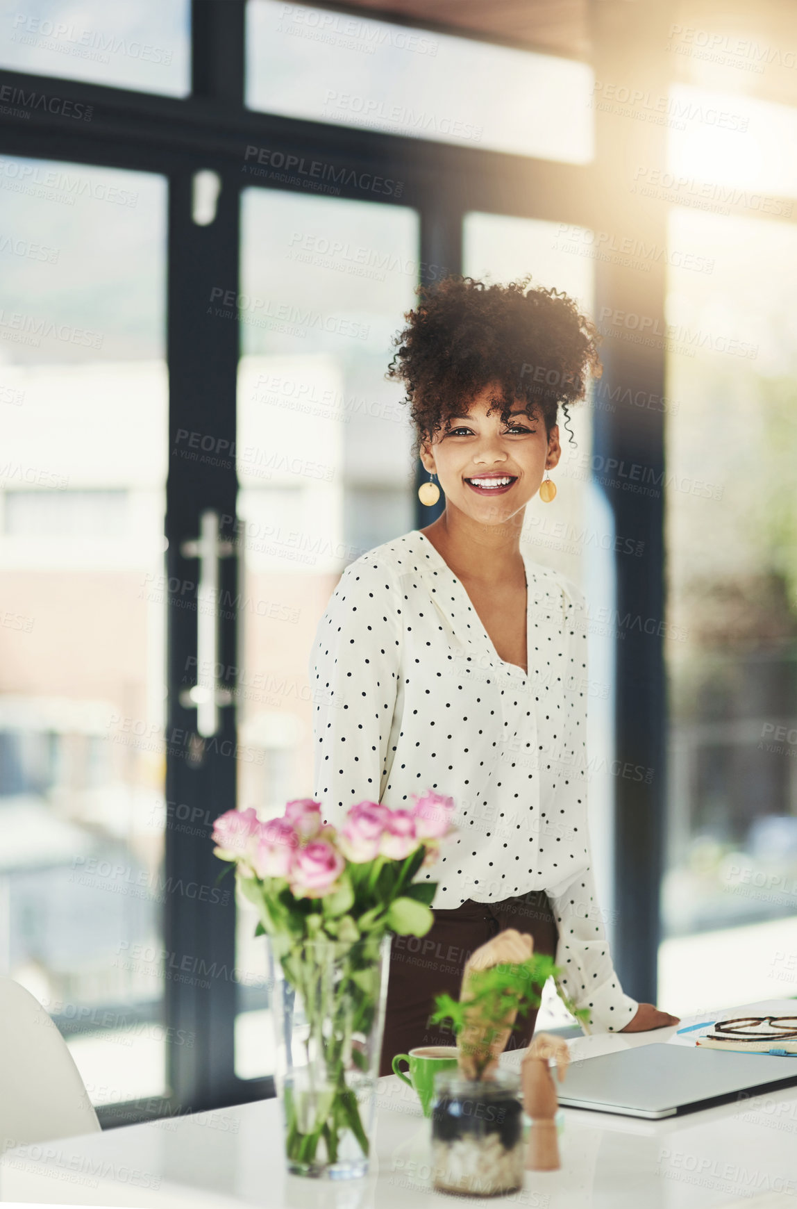 Buy stock photo Shot of a beautiful young businesswoman working in her office 