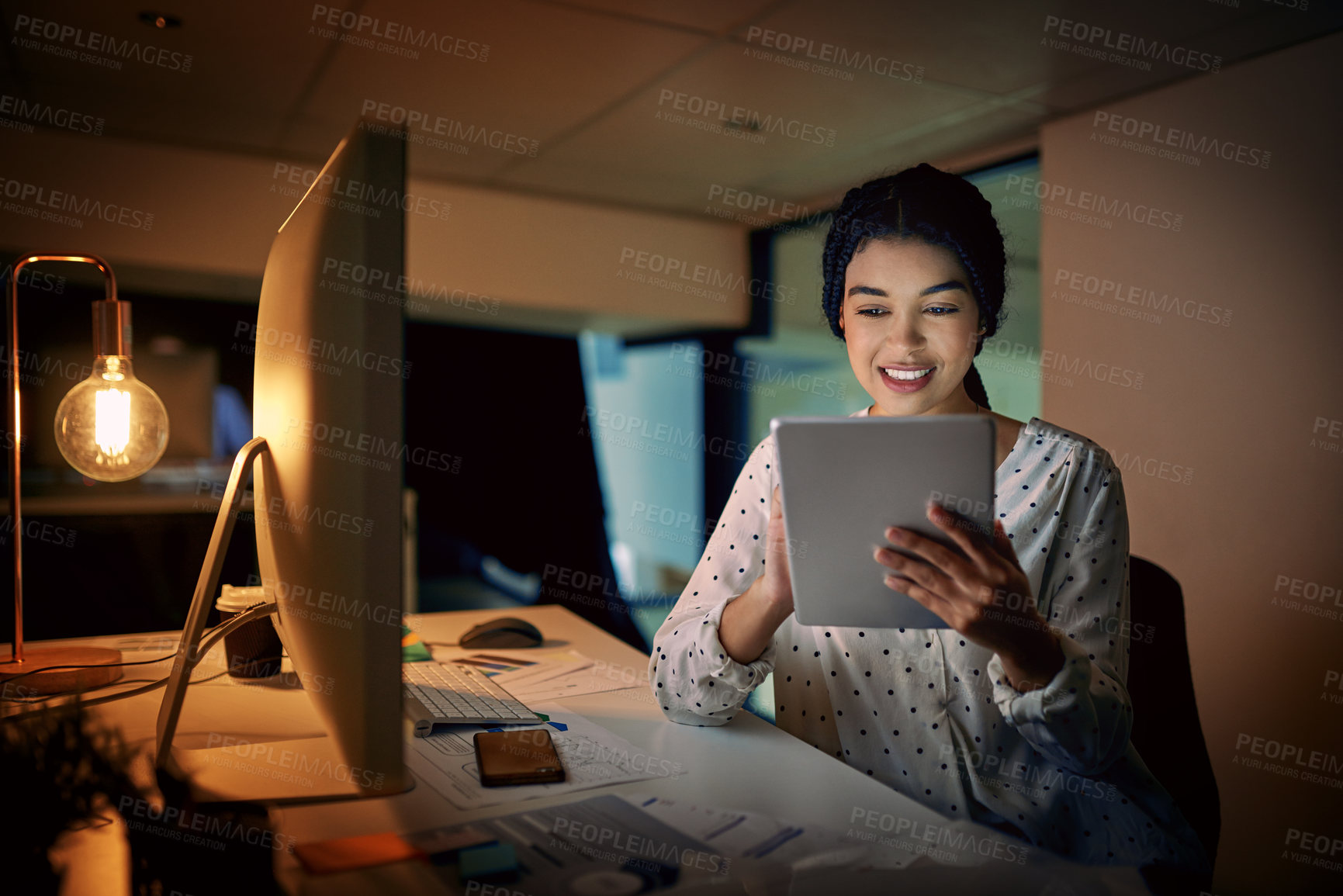 Buy stock photo Office, businesswoman and smile at night with tablet, research and online information for solution. Working late, female person or web designer with computer screen for tech review, update or results