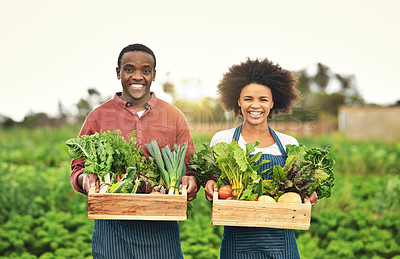 Buy stock photo Cropped portrait of a young farm couple carrying crates of fresh produce