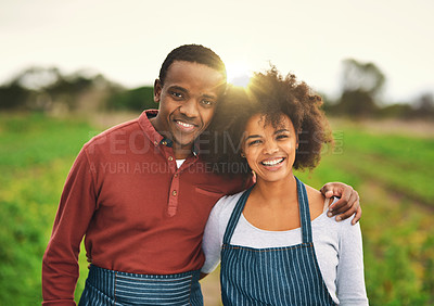 Buy stock photo Cropped portrait of an affectionate young couple standing on their farm