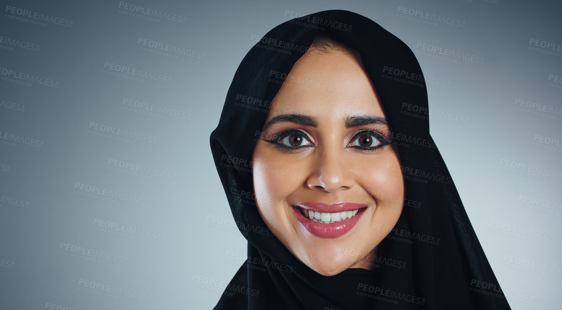 Buy stock photo Studio portrait of a young muslim businesswoman against a grey background