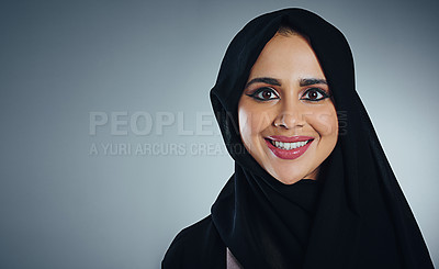 Buy stock photo Studio portrait of a young muslim businesswoman against a grey background
