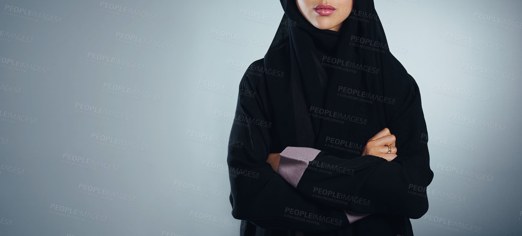 Buy stock photo Studio shot of a young muslim businesswoman against a grey background