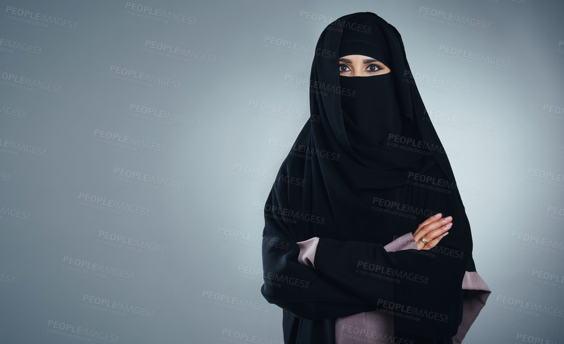 Buy stock photo Studio portrait of a young muslim businesswoman against a grey background