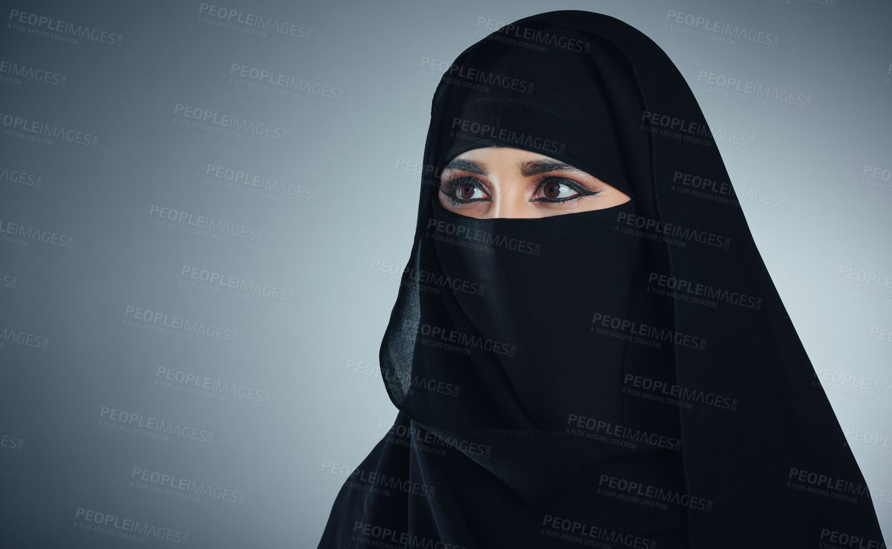 Buy stock photo Studio shot of a young muslim businesswoman against a grey background