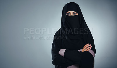 Buy stock photo Studio portrait of a young muslim businesswoman against a grey background