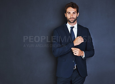 Buy stock photo Portrait, mockup and a formal business man in studio on a blue background for corporate fashion on mock up space. Success, professional and confident young male employee in a suit for executive style