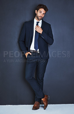 Buy stock photo Portrait, fashion and a corporate business man in studio on a grey background mockup for executive style. Success, professional and a confident young male employee in a suit for formal mock up power