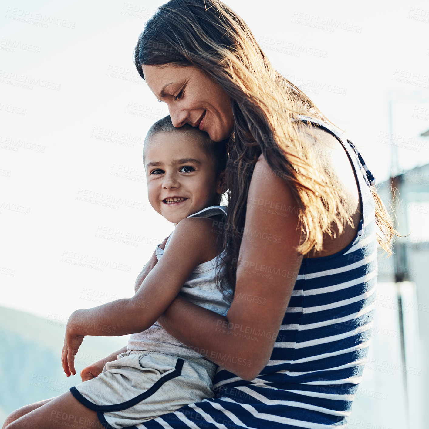 Buy stock photo Portrait, hug and mother with child for bonding, connection and family time together outdoor. Smile, relax and mom holding and embracing boy kid with care, love and sweet moment in backyard of home.