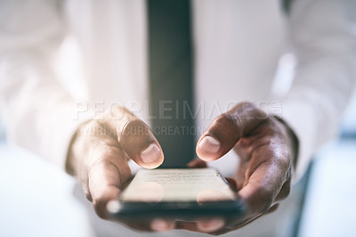 Buy stock photo Shot of a unrecognizable business person holding a cellphone and writing a message