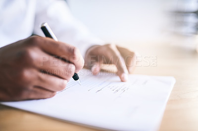 Buy stock photo Shot of a unrecognizable business person signing a document