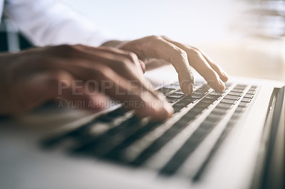 Buy stock photo Closeup shot of a unrecognizable business person typing on a laptop keyboard