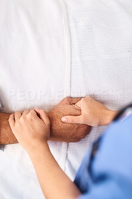 Buy stock photo Healthcare, patient and hands of doctor in clinic for comfort, sharing bad news or cancer diagnosis. Support, top view and kind medical worker with person for test results, advice or consultation